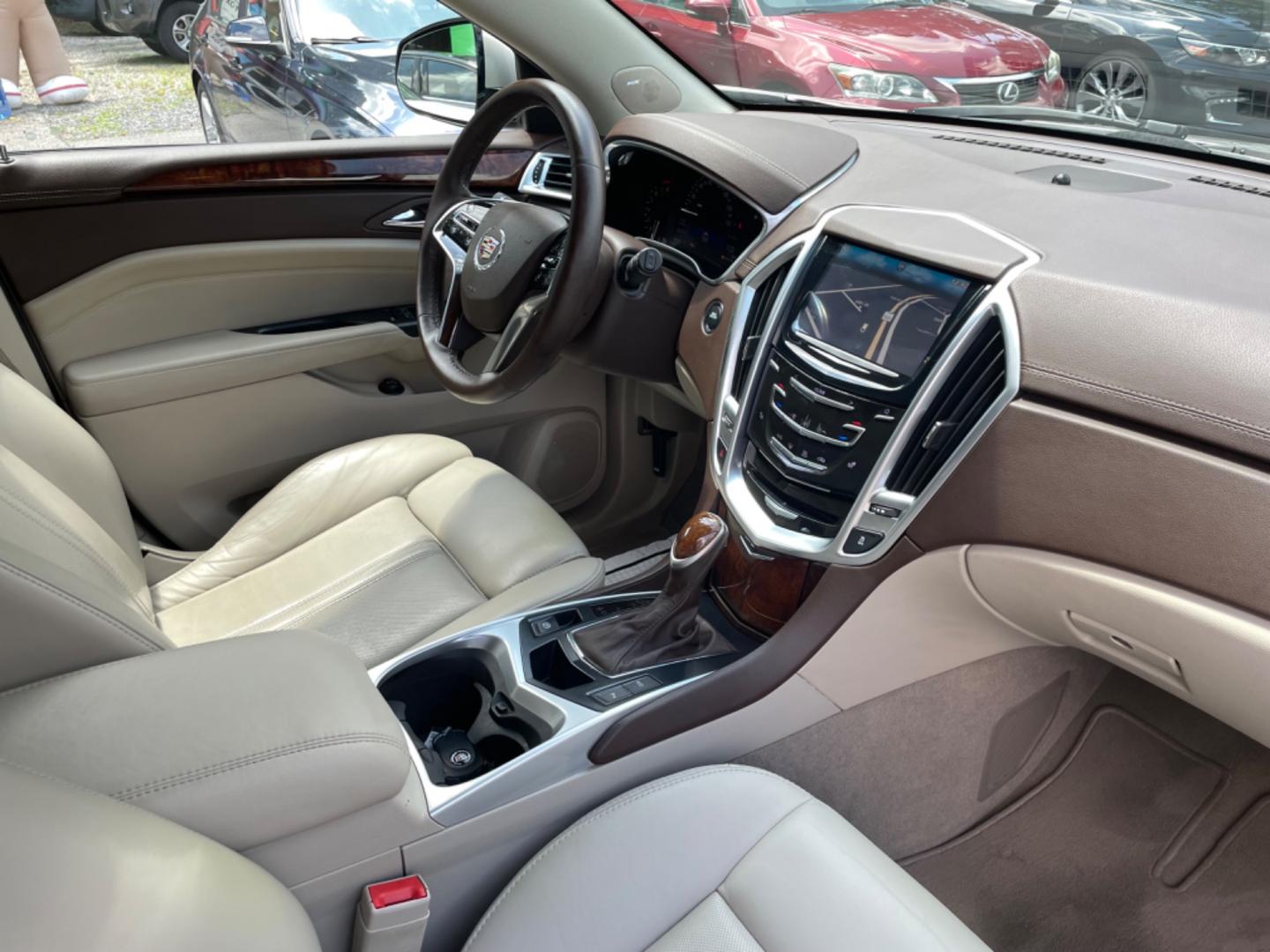 2016 SILVER CADILLAC SRX LUXURY COLLECTION (3GYFNEE33GS) with an 3.6L engine, Automatic transmission, located at 5103 Dorchester Rd., Charleston, SC, 29418-5607, (843) 767-1122, 36.245171, -115.228050 - Photo#8